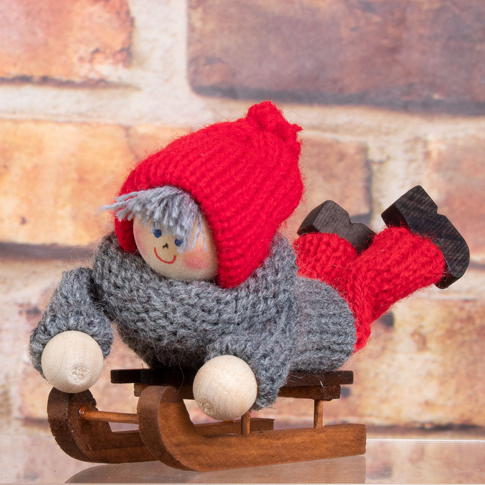 Tomte Boy on Sled