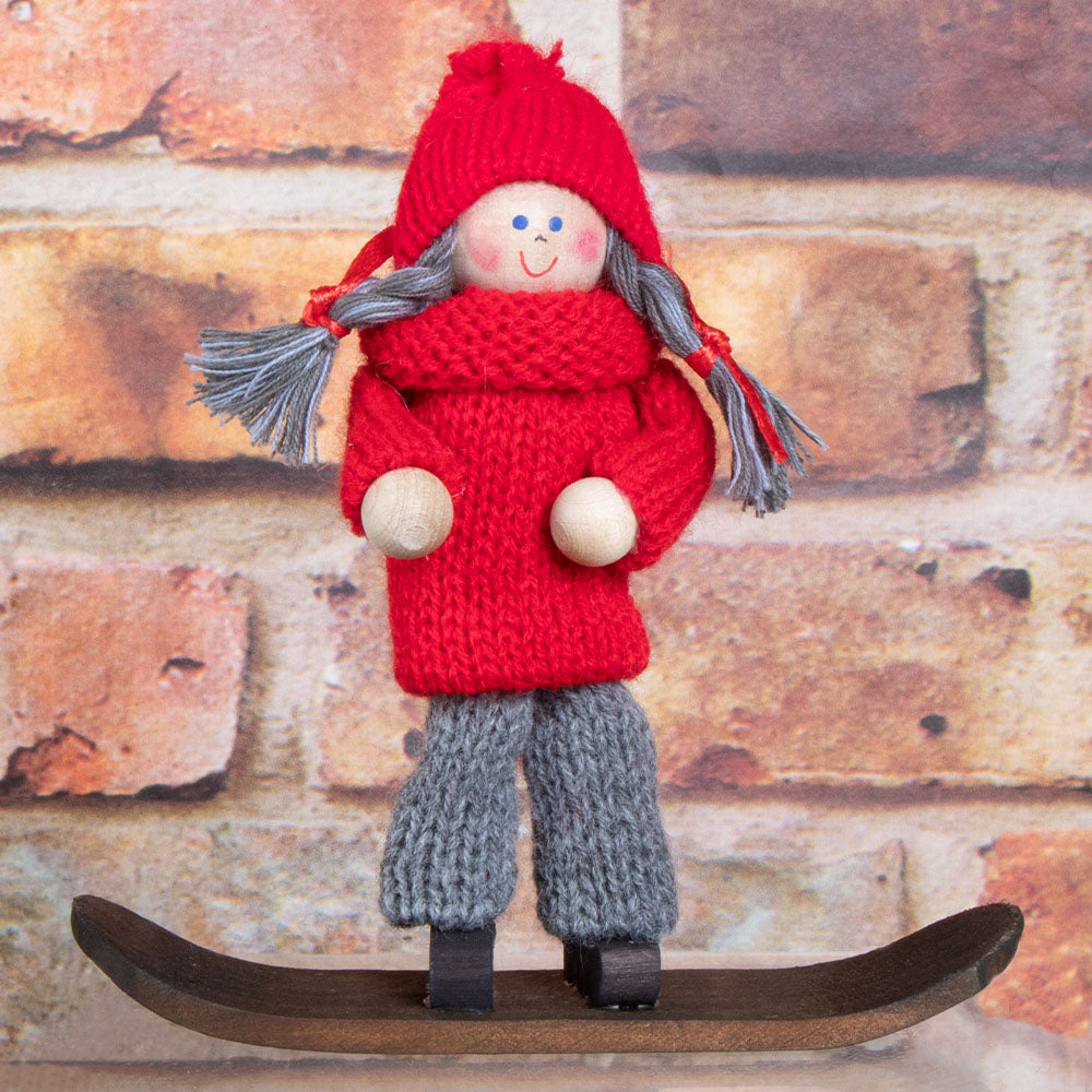 Tomte Girl on Snowboard